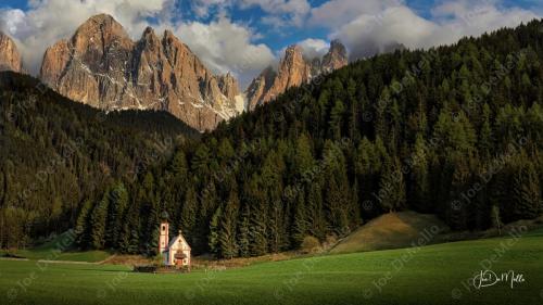 Chiesetta di San Giovanni, located in the picturesque village of Riva del Garda, Italy, is a charming little church perched on a hill with stunning views of the surrounding mountains. Its simple yet beautiful architecture, surrounded by lush greenery and peaceful surroundings, creates a serene and spiritual atmosphere. This hidden gem offers a perfect spot for reflection.
