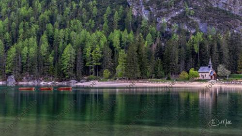 Lago di Braies, nestled in the Dolomites of northern Italy, is a breathtaking alpine lake known for its crystal-clear waters and stunning mountain backdrop. Surrounded by lush forests and towering peaks, it offers a serene escape for nature lovers, hikers, and photographers. 