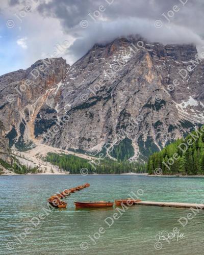 Lago di Braies, located in the Dolomites, is a stunning alpine lake known for its crystal-clear turquoise waters surrounded by towering peaks. The tranquil atmosphere, lush forests, and picturesque views make it a perfect destination for nature lovers, photographers, and outdoor enthusiasts. Often referred to as the Pearl of the Dolomites, it offers a serene escape into nature's beauty.