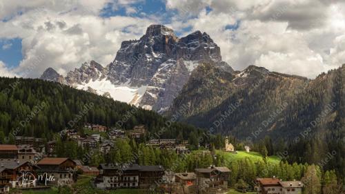 Selva di Cadore is a charming village nestled in the Dolomites of northern Italy. Surrounded by stunning mountain landscapes, it offers a peaceful retreat for outdoor enthusiasts, with hiking in the summer and skiing in the winter. The village blends traditional alpine charm with breathtaking views, making it a perfect destination for nature lovers and adventure seekers.