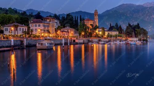 Tremezzo is a picturesque village on the shores of Lake Como in Italy, known for its stunning views of the lake and surrounding mountains. The village boasts beautiful villas, including the famous Villa Carlotta, and charming narrow streets lined with colorful buildings. With its tranquil atmosphere and scenic beauty, Tremezzo offers a perfect escape for nature lovers and history enthusiasts alike.